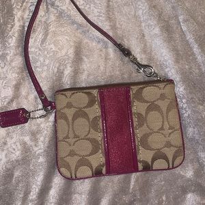 Coach wristlet plum purple and tan